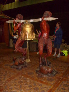 Fauns carry a bell with carvings of the seven Lords Fauns carry a bell with carvings of the seven Lords - side 1
