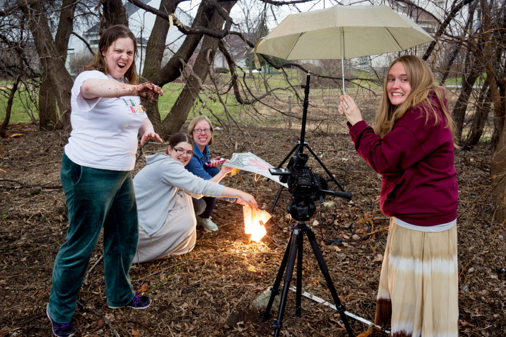 Braving the rain, filming the April Fools trailer.