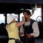 Putting on makeup - Bayside Bulletin