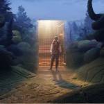 Lucy standing in the doorway to the Magician's House