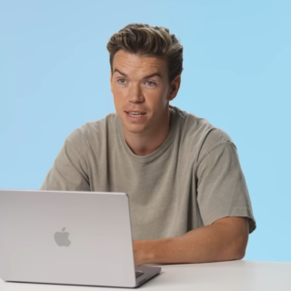 Will Poulter and a laptop.